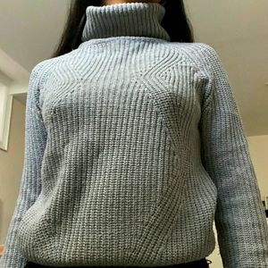Gray knit turtleneck sweater